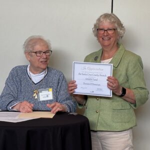 Doreen ODonovan is awarded AAUW Funds Named Gift Honoree by Lynn Cunmins at AAUW of Santa Cruz County May Meeting