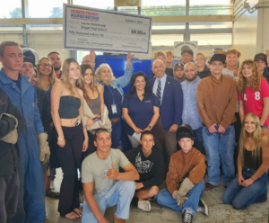 Laurie Hildebrand, Soquel-High-School-welding-teacher-awarded  $50,000. Pictured with students.